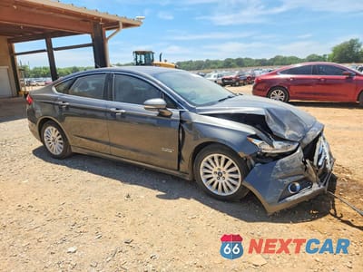 Czwarte zdjęcie samochodu z boku: 2015 FORD FUSION SE PHEV VIN:3FA6P0PU3FR307613 - miniatura