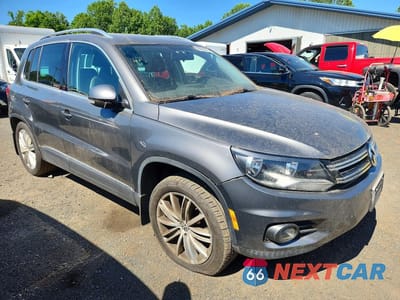 Czwarte zdjęcie samochodu z boku: 2012 VOLKSWAGEN TIGUAN S VIN:WVGBV7AX1CW005705 - miniatura