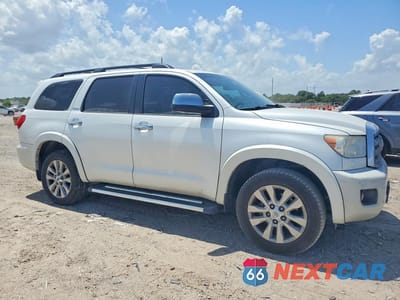Czwarte zdjęcie samochodu z boku: 2017 TOYOTA SEQUOIA PLATINUM VIN:5TDYY5G15HS067662 - miniatura