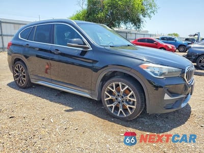 Czwarte zdjęcie samochodu z boku: 2021 BMW X1 SDRIVE28I VIN:WBXJG7C04M5U01633 - miniatura