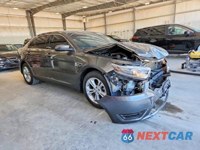 Czwarte zdjęcie samochodu z boku: 2016 FORD TAURUS SEL VIN:1FAHP2E85GG131800 - miniatura