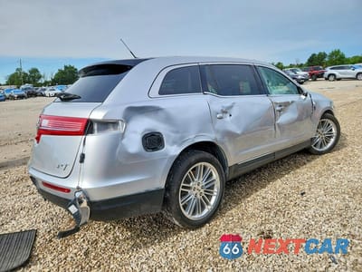 Trzecie zdjęcie samochodu z tyłu: 2018 LINCOLN MKT VIN:2LMHJ5AT5JBL01708 - miniatura