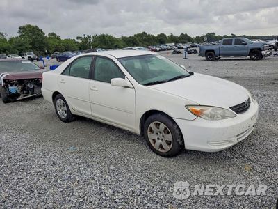 Czwarte zdjęcie samochodu z boku: 2002 TOYOTA CAMRY LE VIN:4T1BE32K32U110056 - miniatura