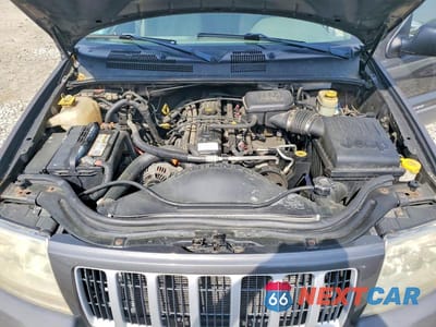 Zdjęcie 11 z 12 samochodu: 2004 JEEP GRAND CHEROKEE LAREDO VIN:1J4GW48S24C371430 - miniatura