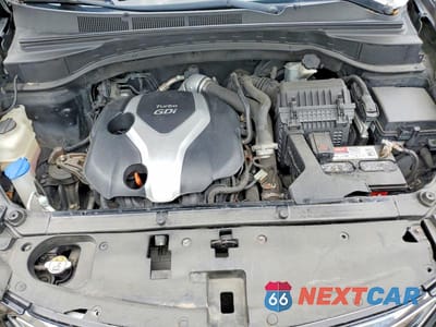 Zdjęcie 12 z 13 samochodu: 2013 HYUNDAI SANTA FE SPORT 2.0T VIN:5XYZUDLA8DG082812 - miniatura