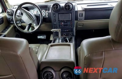 Zdjęcie 8 z 13 samochodu: 2003 HUMMER H2 VIN:5GRGN23U53H138681 - miniatura