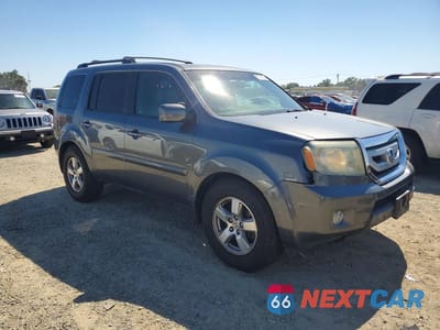 Czwarte zdjęcie samochodu z boku: 2011 HONDA PILOT EXLN VIN:5FNYF4H72BB014948 - miniatura