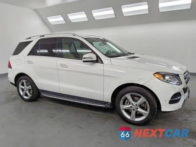 Czwarte zdjęcie samochodu z boku: 2016 MERCEDES-BENZ GLE 350 VIN:4JGDA5JB9GA686065 - miniatura