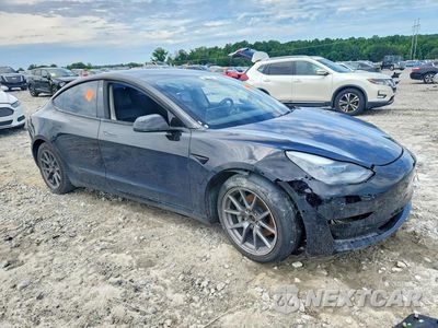 Czwarte zdjęcie samochodu z boku: 2022 TESLA MODEL 3 VIN:5YJ3E1EB2NF191556 - miniatura