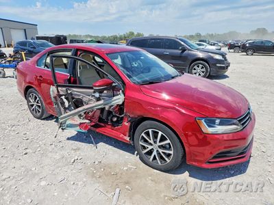 Czwarte zdjęcie samochodu z boku: 2017 VOLKSWAGEN JETTA SE VIN:3VWDB7AJ7HM340439 - miniatura