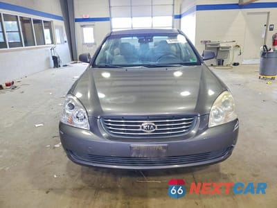 Piąte zdjęcie samochodu w środku: 2007 KIA OPTIMA LX VIN:KNAGE123275139392 - miniatura