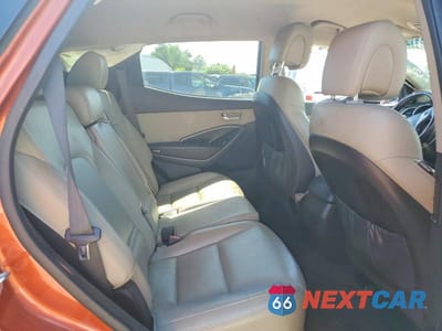 Zdjęcie 11 z 13 samochodu: 2013 HYUNDAI SANTA FE SPORT 2.0T VIN:5XYZU3LA2DG047239 - miniatura