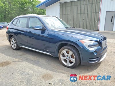Czwarte zdjęcie samochodu z boku: 2013 BMW X1 XDRIVE28I VIN:WBAVL1C57DVR87387 - miniatura