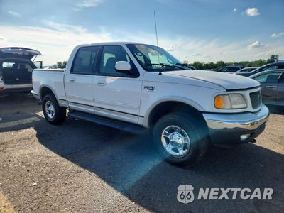 Czwarte zdjęcie samochodu z boku: 2001 FORD F150 SUPERCREW VIN:1FTRW08L71KD52633 - miniatura