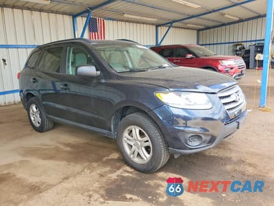 Czwarte zdjęcie samochodu z boku: 2012 HYUNDAI SANTA FE GLS VIN:5XYZGDAB9CG164825 - miniatura