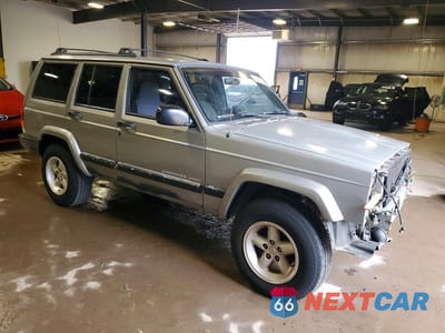 Czwarte zdjęcie samochodu z boku: 2000 JEEP CHEROKEE SPORT VIN:1J4FF48S1YL152346 - miniatura