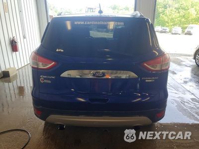 Zdjęcie 6 z 13 samochodu: 2016 FORD ESCAPE TITANIUM VIN:1FMCU9JX6GUA51390 - miniatura