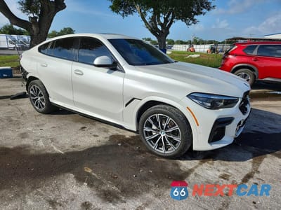 Czwarte zdjęcie samochodu z boku: 2023 BMW X6 XDRIVE40I VIN:5UXCY6C09P9R79459 - miniatura