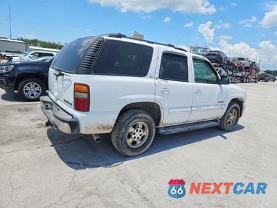 Trzecie zdjęcie samochodu z tyłu: 2002 CHEVROLET TAHOE C1500 VIN:1GNEC13Z82R325160 - miniatura
