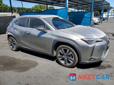Czwarte zdjęcie samochodu z boku: 2021 LEXUS UX 250H VIN:JTHX9JBH7M2052926 - miniatura