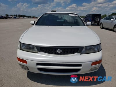 Piąte zdjęcie samochodu w środku: 1996 NISSAN MAXIMA GXE VIN:JN1CA21D9TM417138 - miniatura