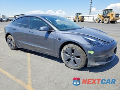 Czwarte zdjęcie samochodu z boku: 2023 TESLA MODEL 3 VIN:5YJ3E1EA8PF516236 - miniatura