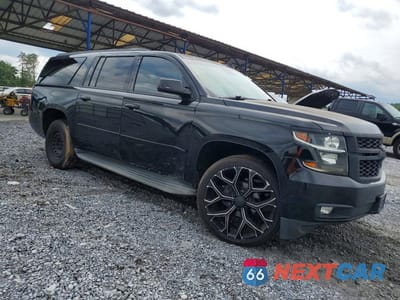 Czwarte zdjęcie samochodu z boku: 2015 CHEVROLET SUBURBAN C1500 LT VIN:1GNSCJKC2FR623290 - miniatura