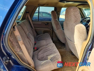 Zdjęcie 10 z 12 samochodu: 1999 GMC JIMMY VIN:1GKDT13W7X2524991 - miniatura