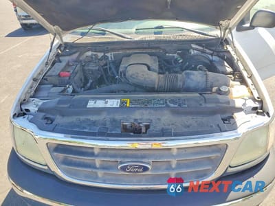 Zdjęcie 11 z 12 samochodu: 2002 FORD F-150 VIN:1FTRX17W02NB82565 - miniatura