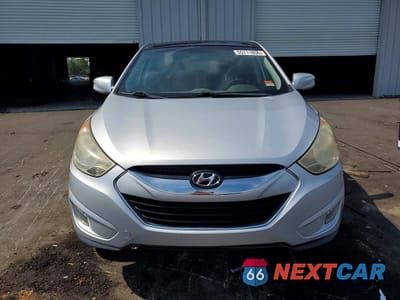 Piąte zdjęcie samochodu w środku: 2012 HYUNDAI TUCSON LIMITED VIN:KM8JU3AC2CU487035 - miniatura