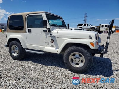 Czwarte zdjęcie samochodu z boku: 2002 JEEP WRANGLER / TJ SAHARA VIN:1J4FA59S12P768194 - miniatura