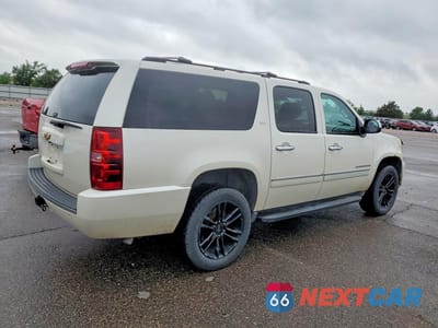 Trzecie zdjęcie samochodu z tyłu: 2013 CHEVROLET SUBURBAN K1500 LTZ VIN:1GNSKKE7XDR185753 - miniatura