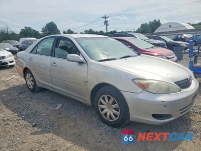 Czwarte zdjęcie samochodu z boku: 2002 TOYOTA CAMRY LE VIN:4T1BE32K92U091612 - miniatura
