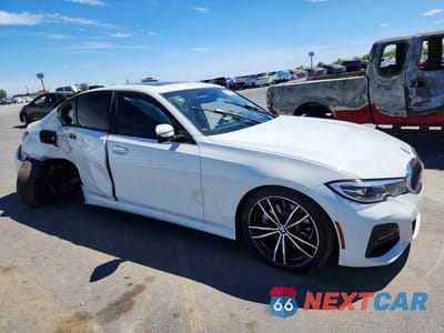 Czwarte zdjęcie samochodu z boku: 2019 BMW 330I VIN:WBA5R1C54KAK06621 - miniatura