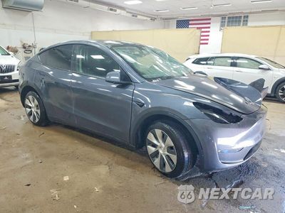 Czwarte zdjęcie samochodu z boku: 2023 TESLA MODEL Y VIN:7SAYGDEE7PF807589 - miniatura