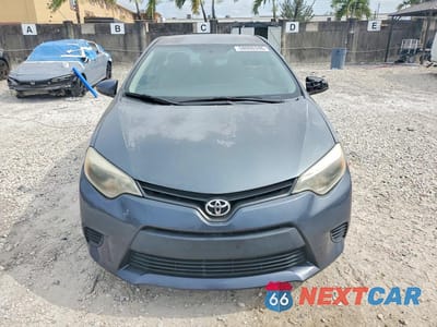 Piąte zdjęcie samochodu w środku: 2016 TOYOTA COROLLA L VIN:5YFBURHE2GP509041 - miniatura