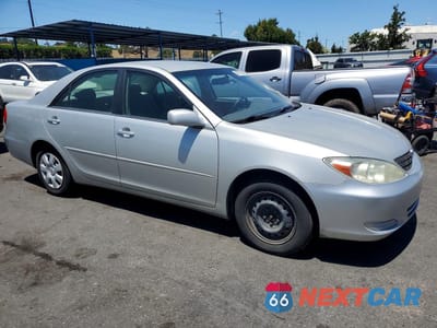 Czwarte zdjęcie samochodu z boku: 2003 TOYOTA CAMRY LE VIN:4T1BE32K63U715643 - miniatura