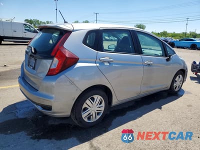 Trzecie zdjęcie samochodu z tyłu: 2020 HONDA FIT LX VIN:3HGGK5H48LM729024 - miniatura