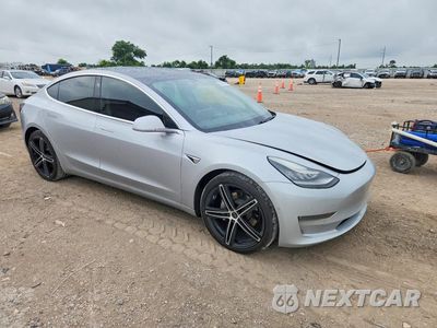 Czwarte zdjęcie samochodu z boku: 2018 TESLA MODEL 3 VIN:5YJ3E1EBXJF116968 - miniatura