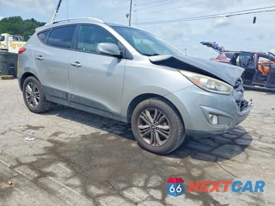 Czwarte zdjęcie samochodu z boku: 2015 HYUNDAI TUCSON SE VIN:KM8JU3AG1FU012807 - miniatura