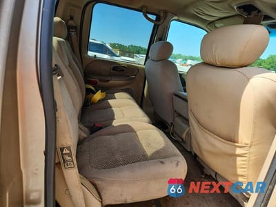 Zdjęcie 10 z 13 samochodu: 2002 FORD F150 SUPERCREW VIN:1FTRW07682KE38675 - miniatura