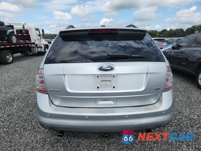 Zdjęcie 6 z 12 samochodu: 2010 FORD EDGE SEL VIN:2FMDK3JC1ABB35120 - miniatura