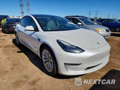 Czwarte zdjęcie samochodu z boku: 2023 TESLA MODEL 3 VIN:5YJ3E1EA8PF491581 - miniatura