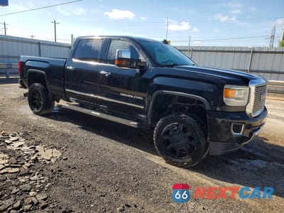 Czwarte zdjęcie samochodu z boku: 2016 GMC SIERRA K2500 DENALI VIN:1GT12UE81GF116299 - miniatura