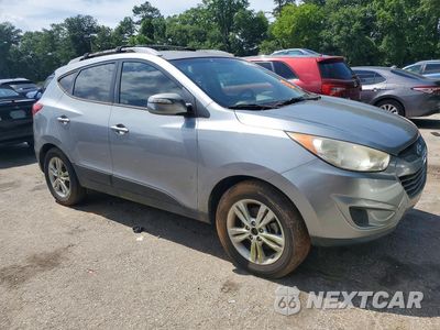 Czwarte zdjęcie samochodu z boku: 2012 HYUNDAI TUCSON GLS VIN:KM8JU3AC6CU489161 - miniatura