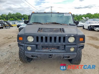Piąte zdjęcie samochodu w środku: 2003 HUMMER H2 VIN:5GRGN23U53H138681 - miniatura