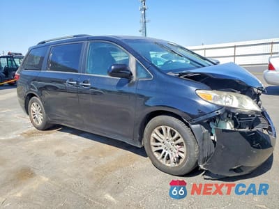 Czwarte zdjęcie samochodu z boku: 2016 TOYOTA SIENNA XLE 8-PASSENGER VIN:5TDYK3DC1GS749397 - miniatura