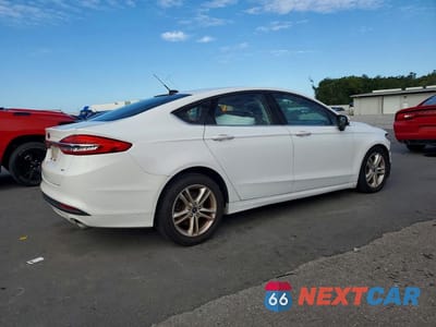 Trzecie zdjęcie samochodu z tyłu: 2018 FORD FUSION SE VIN:3FA6P0H72JR277988 - miniatura