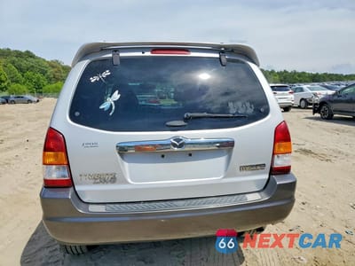 Zdjęcie 6 z 13 samochodu: 2003 MAZDA TRIBUTE LX VIN:4F2YZ94143KM11202 - miniatura