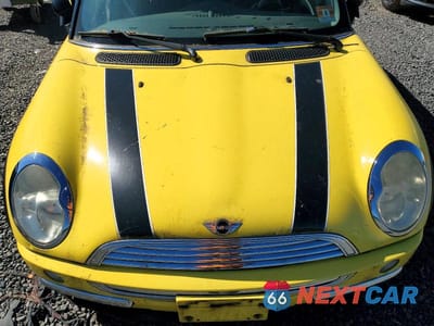 Zdjęcie 11 z 12 samochodu: 2004 MINI COOPER VIN:WMWRC33424TJ59649 - miniatura